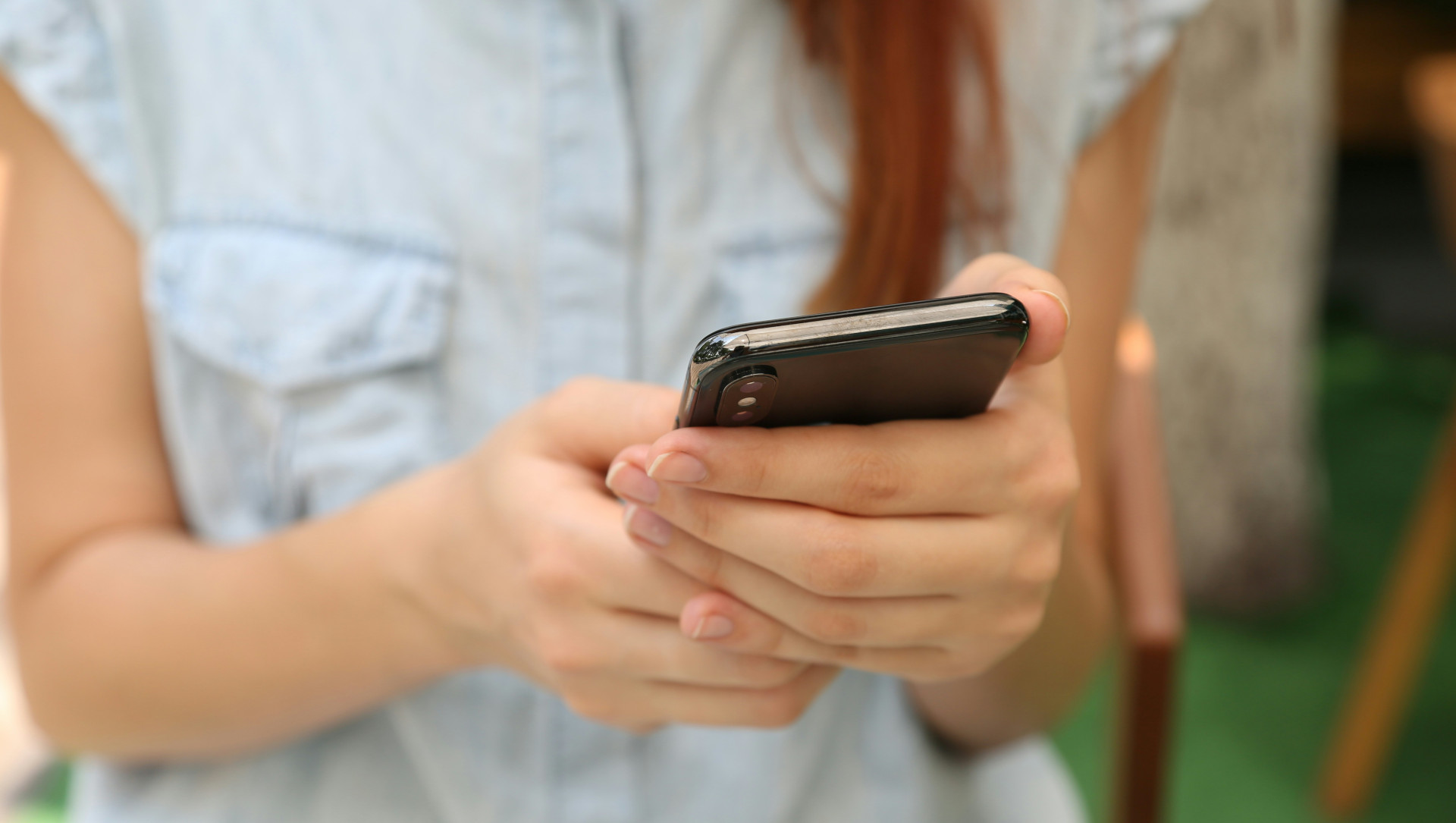 Woman holding a smartphone